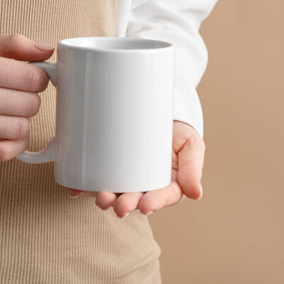 mockup-white-coffe-cup-or-mug-in-female-hands-2021-10-21-02-28-53-utc